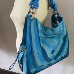 Stuart Weitzman blue suede and leather hobo with stainless steel hardware. NWOT. Multi strand leather straps, magnetic closure, double sided bag with 