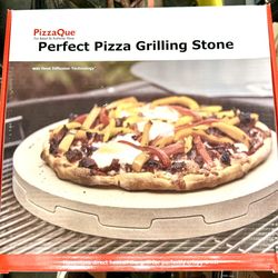 New PizzaQue Fire Baked for Authentic Flavor Perfect Pizza Grilling Stone  CONTAINS: Two 14 in (35.6 cm) diameter round interlocking ThermaBond® stone