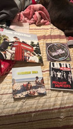 2 one direction vinyl, 1 harry styles watermelon sugar vinyl, 1 one direction cd with a photo book