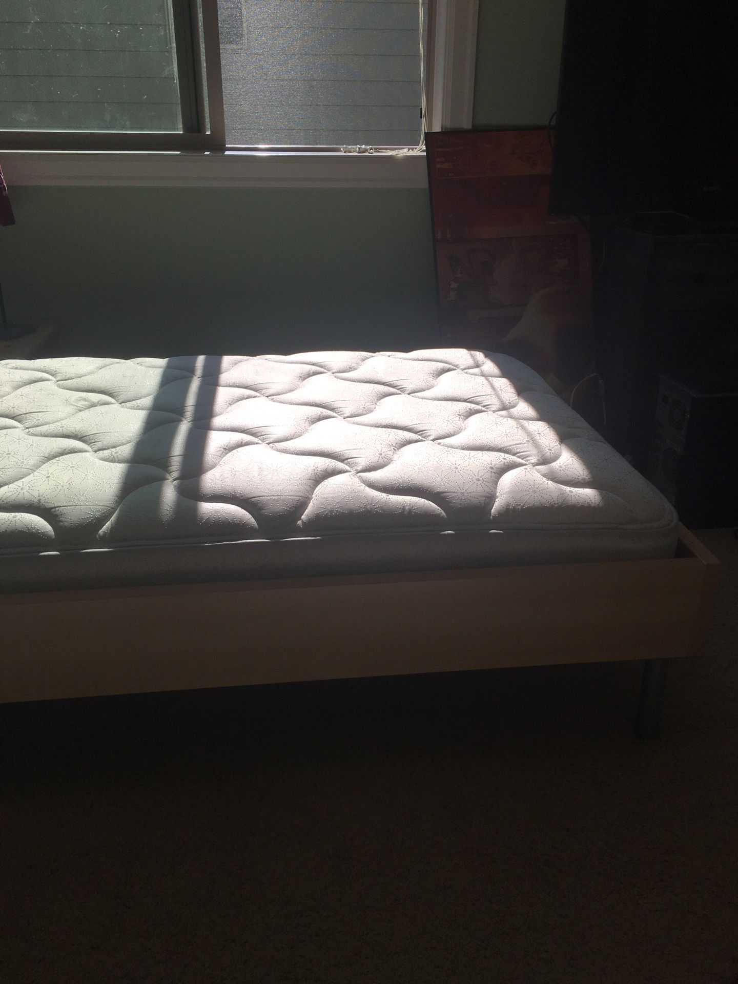 IKEA twin bed frame and bed.