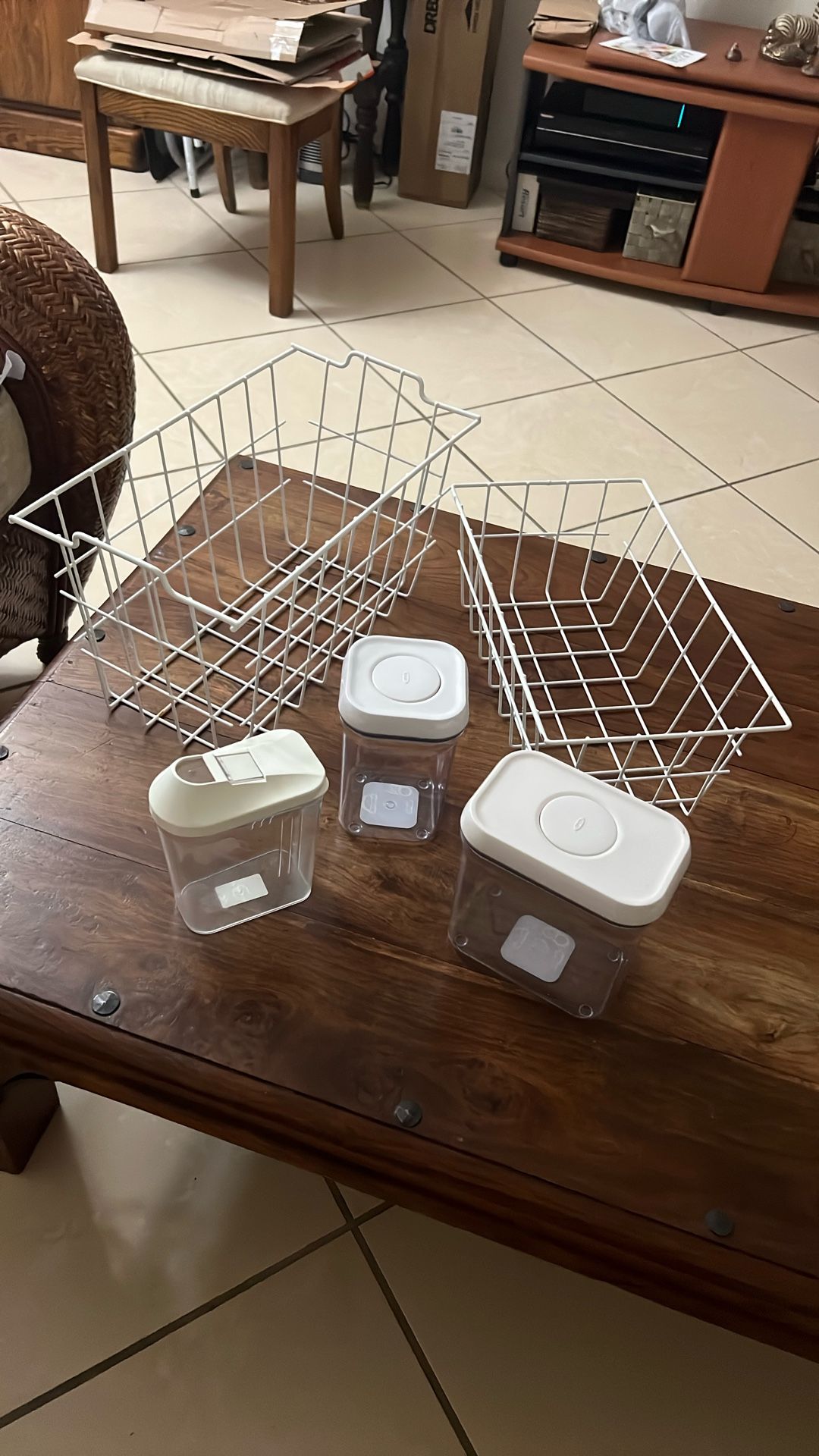 Two Wire Storage Baskets And Three Plastic Airtight Storage Containers