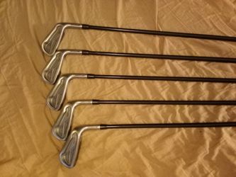 Golf clubs and bag .