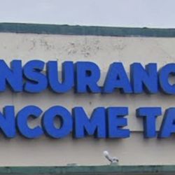 Insurance and Income Tax signs