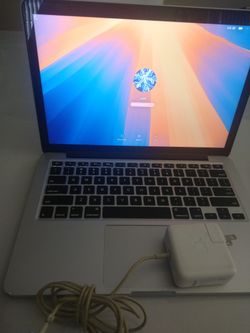 APPLE MACBOOK PRO RETINA 128SSD 8GB RAM AND CHARGER