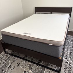 Queen size bed in IKEA frame. 12 inch Casper foam mattress and 4 inch bed story topper. Great condition.