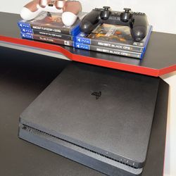 PLAYSTATION 4 SLIM + ACCESSORIES
