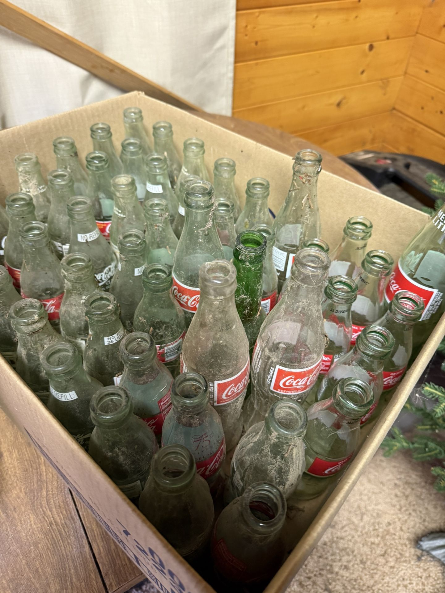 Assorted vintage Coke bottles
