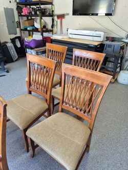 6 matching dining room chairs wooden good condition. About 15in to fabric seat, 43in to top of back. 23in wide 19in deep. $60 for the set