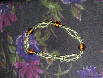 Gold tone bracelet with beads