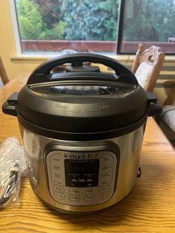 Instant pot duo, 6 quart seven and one electric pressure cooker, stainless steel, brand new, never used.