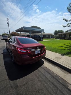 Nissan Altima Sedan – Red