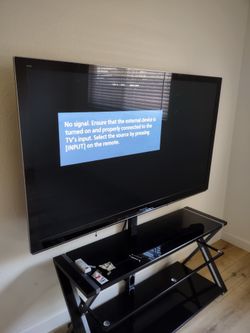 Panasonic 65" Plasma HDTV TC-P65GT30 1080p 3D Smart TV, With Table Under It