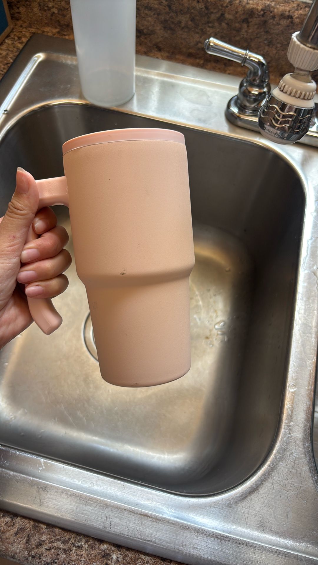 Pink cup with straw and handle