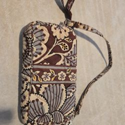 Vera Bradley small purse/wallet hand/wrist 100% Cotton color: brown/blue,white, lightweight.

Pickup East side El Paso by Lee Trevino and Pelicano 