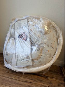 Neutral Cream Baby Lounger with Subtle Animal Print