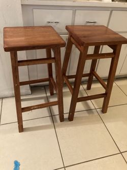 2 wooden stools