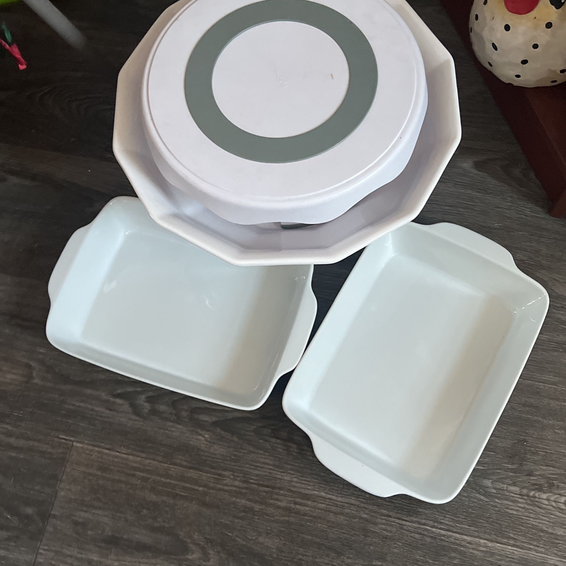 White Dishes For Party Decoration Like Weddings And Baptisms Big Bowl 15.5” Diameter X “ Tall Pans 9”X14 Inches And Cake Stand Is 13” Inches Diameter