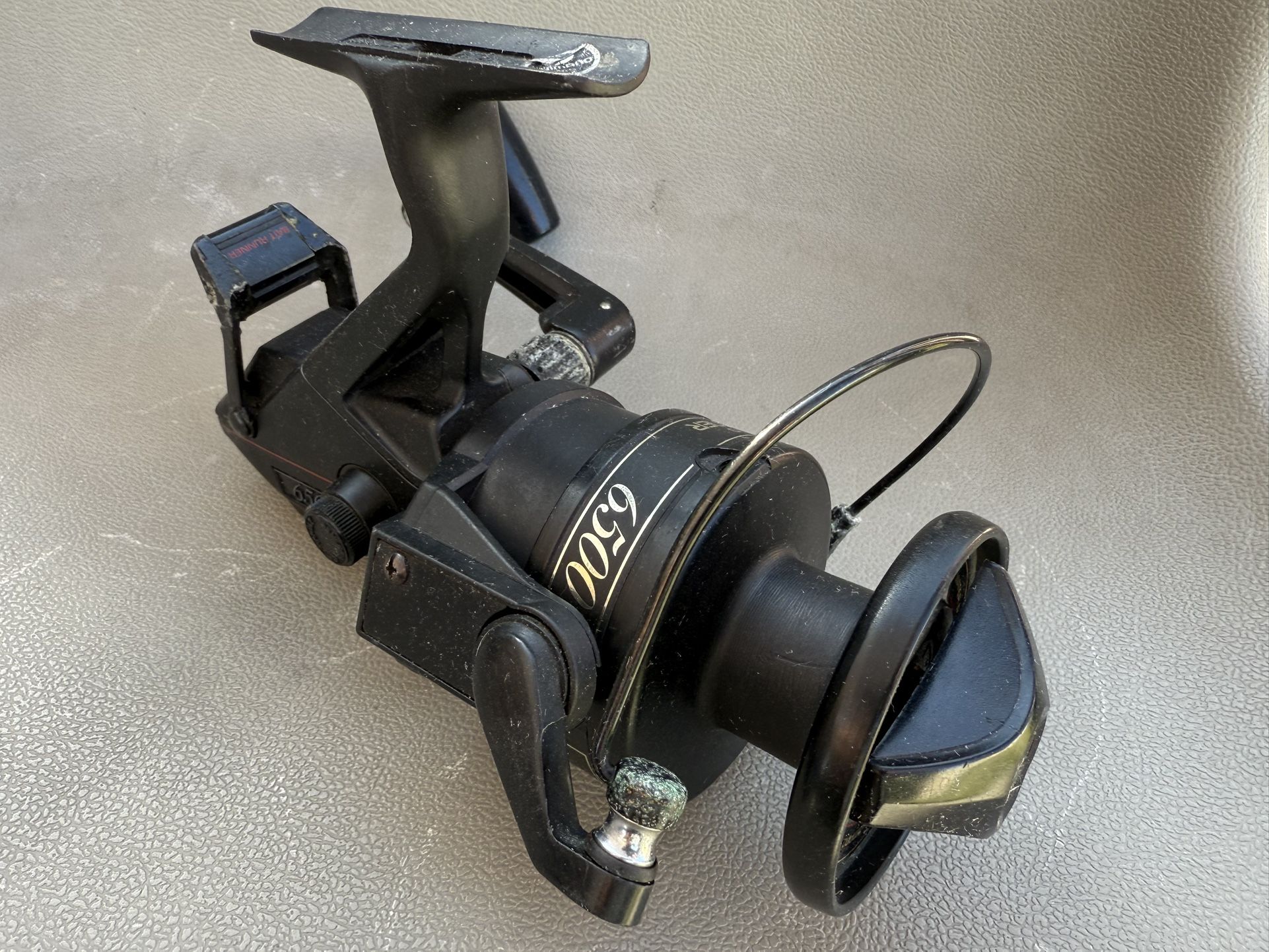 Shimano Triton 6500 “Baitrunner” Saltwater Spinning Fishing Reel