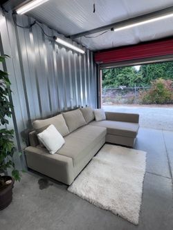 (Delivery) Like New Beige Sleeper Sectional Couch with Reversible Chaise