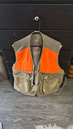 Hunting vest shot gun shel holder in pickets and picked for birds