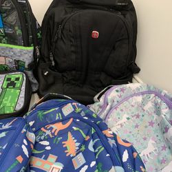 Lots Of Kids School Backpacks And School Lunch Bags 