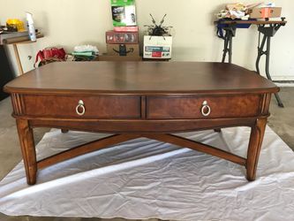 Beautiful All wood Coffee table with two solid wood pull out drawers . Very good condition