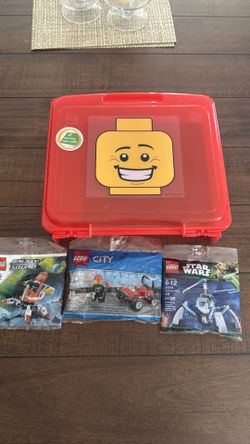 Legos new 3 sets and container