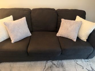 Charcoal couch with pullout bed