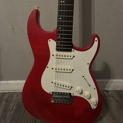 Austin-branded 4-string electric bass And Red Guitar 