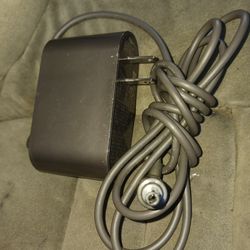 charger for a Dyson cordless vacuum cleaner.