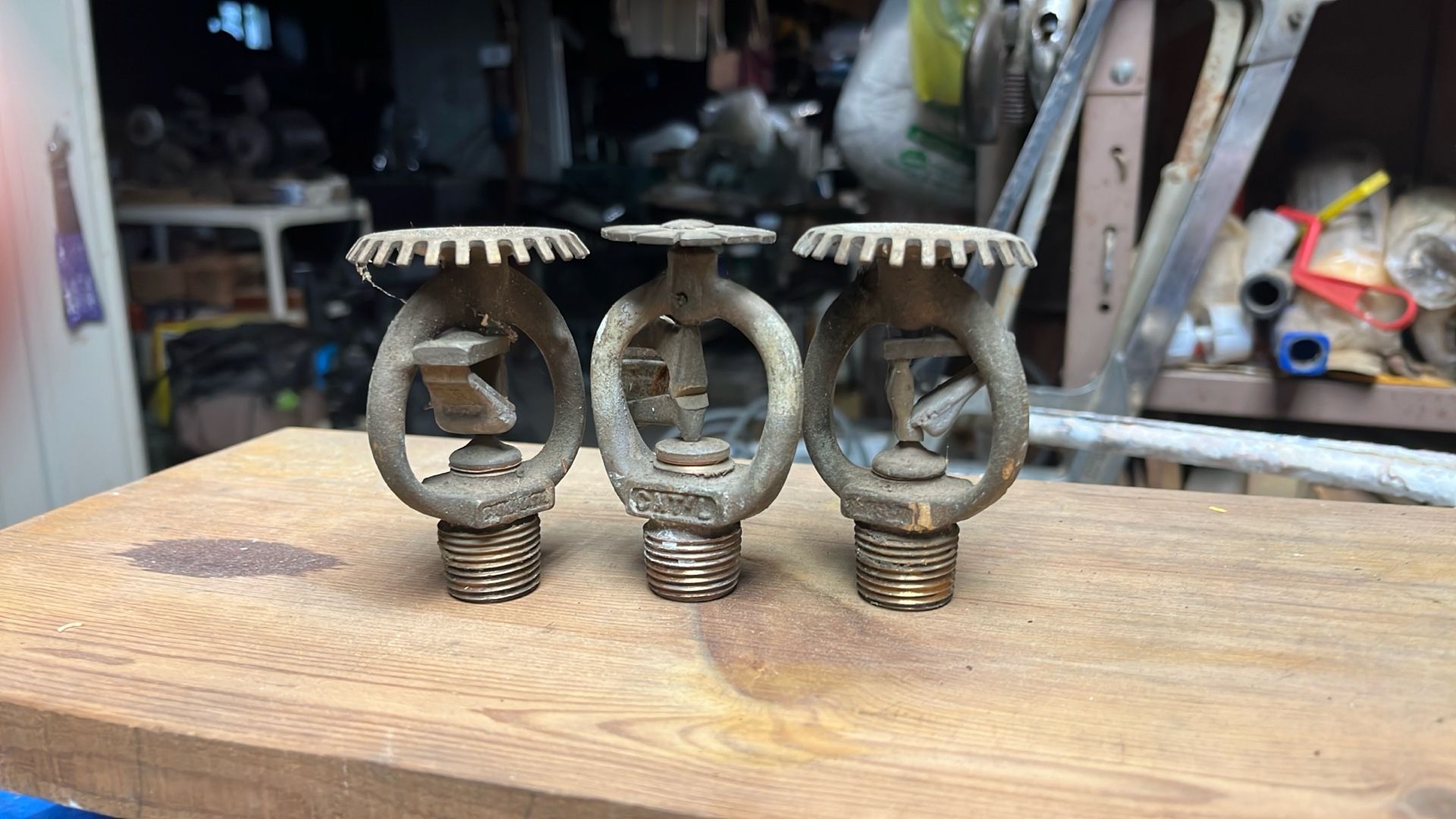 Three Antique Sprinkler Heads