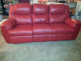 Red leather couch with recliners
