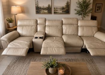 Reclining beige leather couch