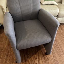 Two Vintage Arm Gray Chairs With Wheels