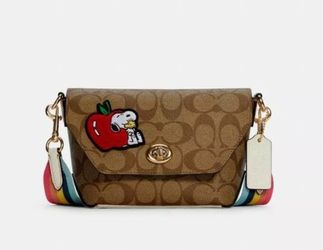 Coach X Peanuts Karlee Crossbody In Signature Canvas With Snoopy 