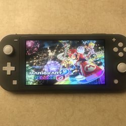 Nintendo Switch Lite + 125 Popular Switch Games Instlled