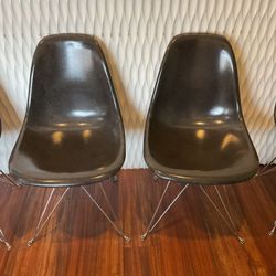 MCM Modernica Case Study side shell chair with Eiffel base in black. Set of 4.