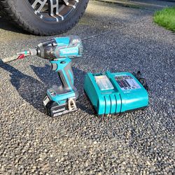 Makita Impact Drill With Charger 