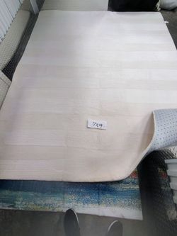Cream Area Rug 7x9(new)