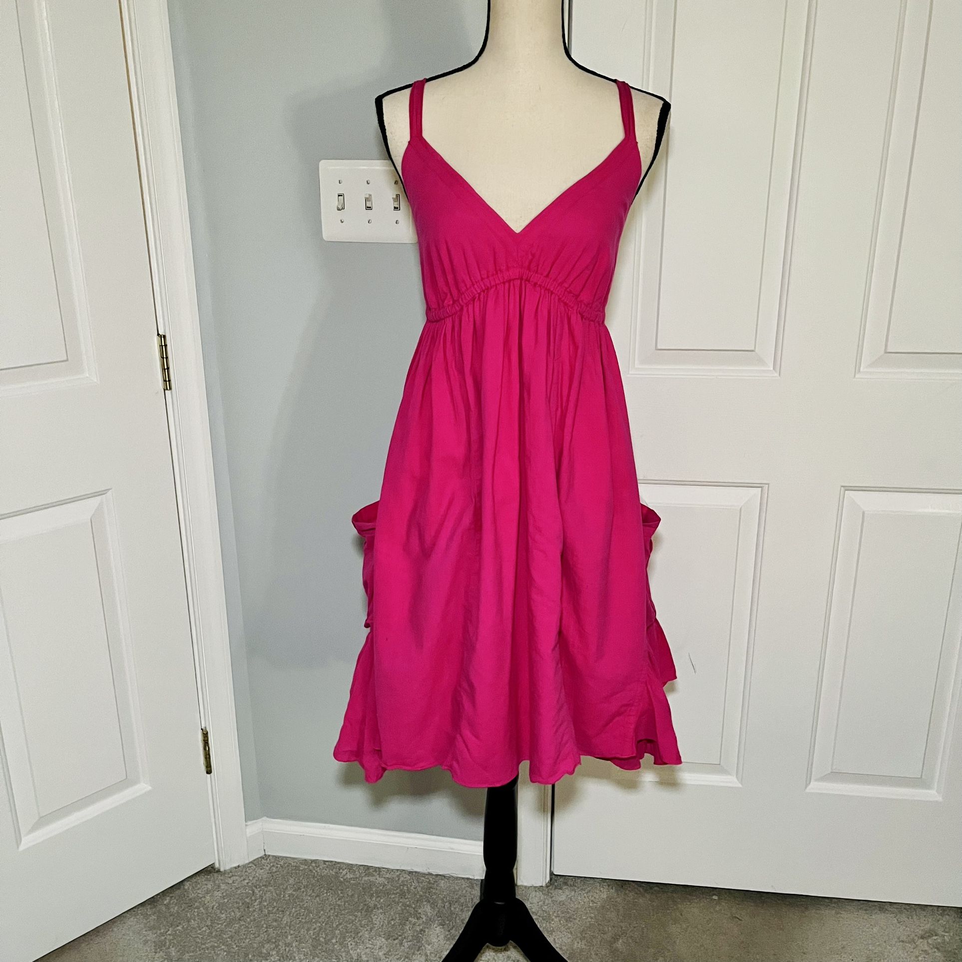 Hot pink dress with large side pockets