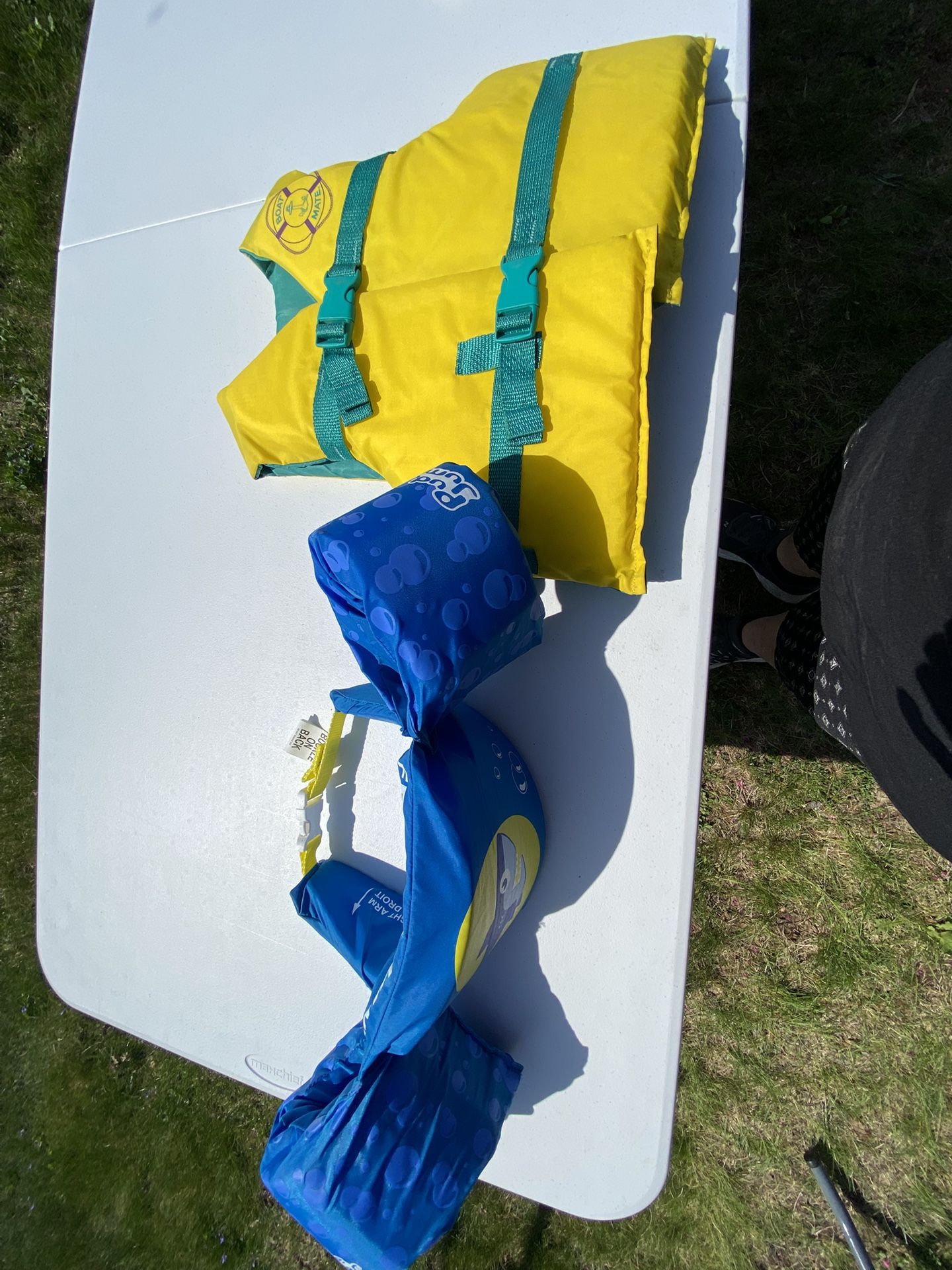 Child’s Life Jacket And Floaters