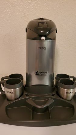 Thermo coffee caddy with 4 cups and coffee stand.