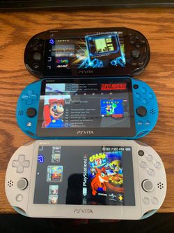 Sony PS Vita 2000 M0ddedWith Games And Charger 