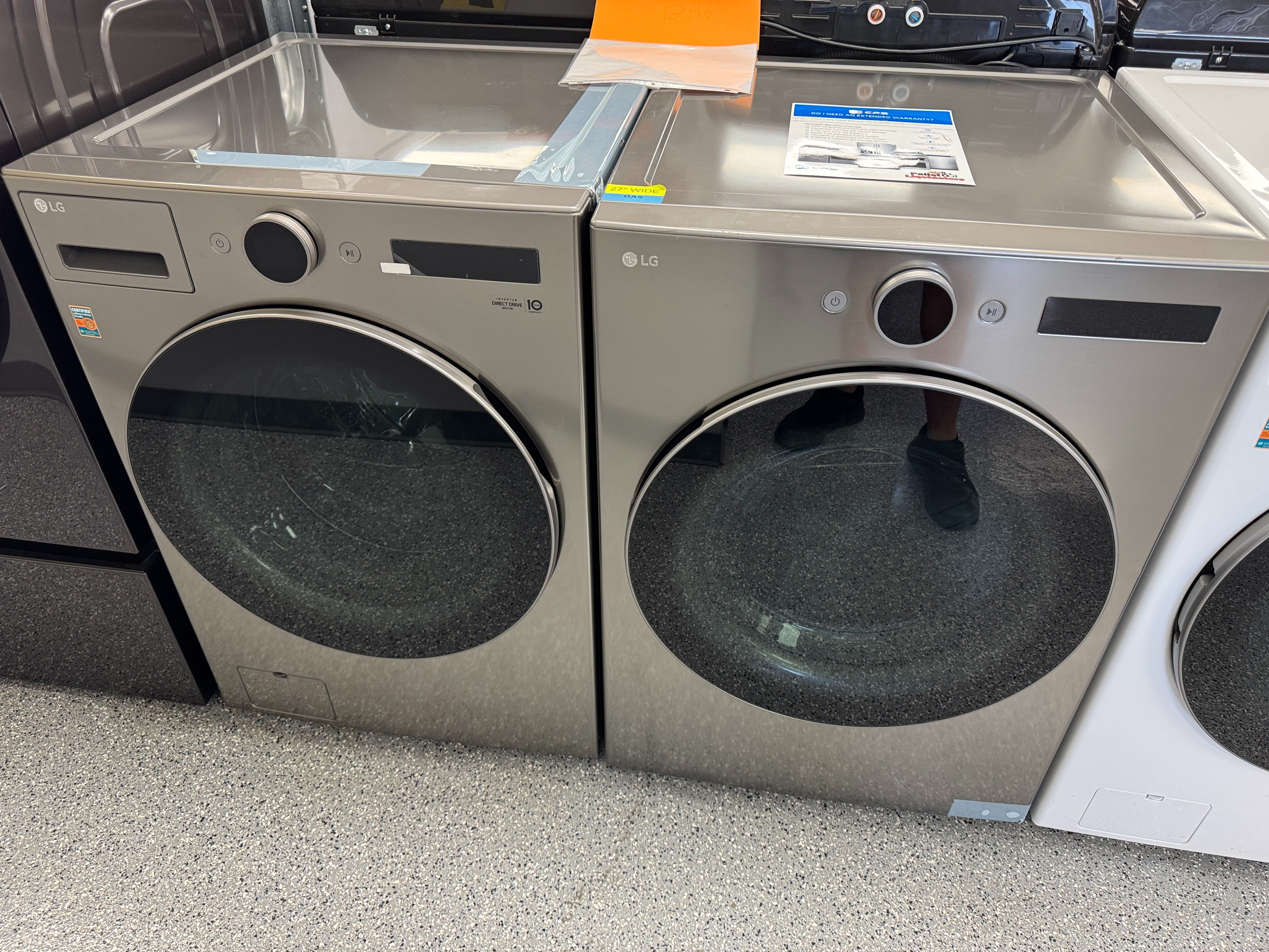 Grey LG Washer 4.5 cu ft and 7.4 cu ft Gas Dryer Set. Units are new open box scratch and dent