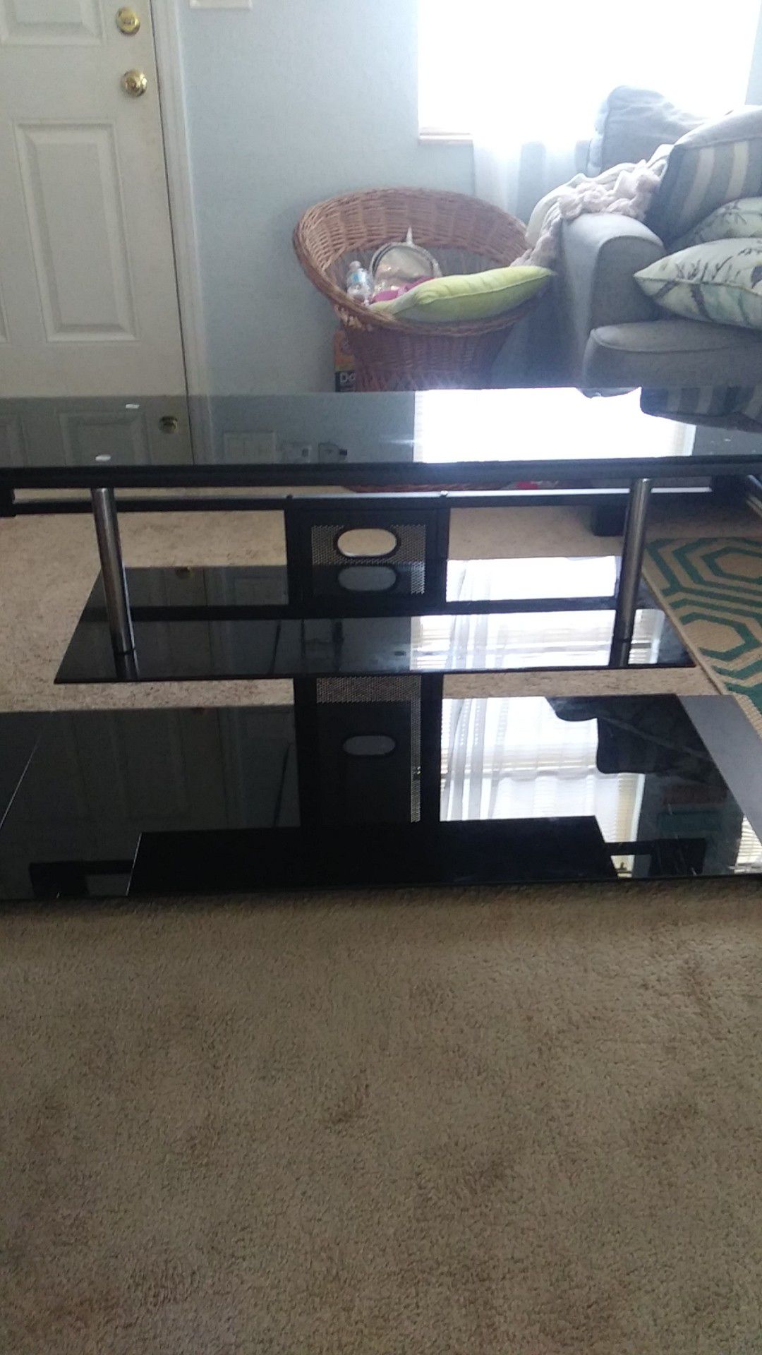 Glass entertainment center in perfect condition