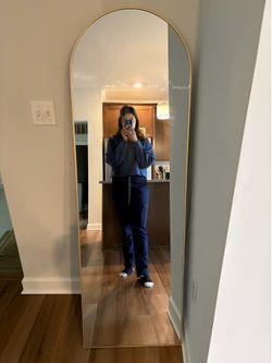 Floor mirror with gold trim