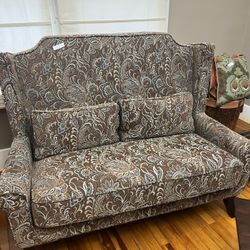 Love Seat With Two Throw Pillows