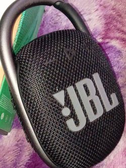 Two JBL clip speakers
