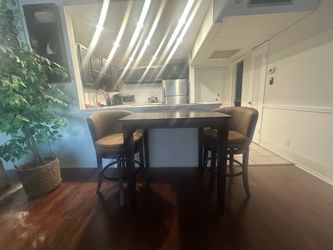 Bar stools and table