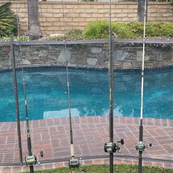 FOUR(4) LEVELWIND Fishing Reels(3 PENN Reels and an OKUMA)-All with Fishing Rods-$100 for ALL.